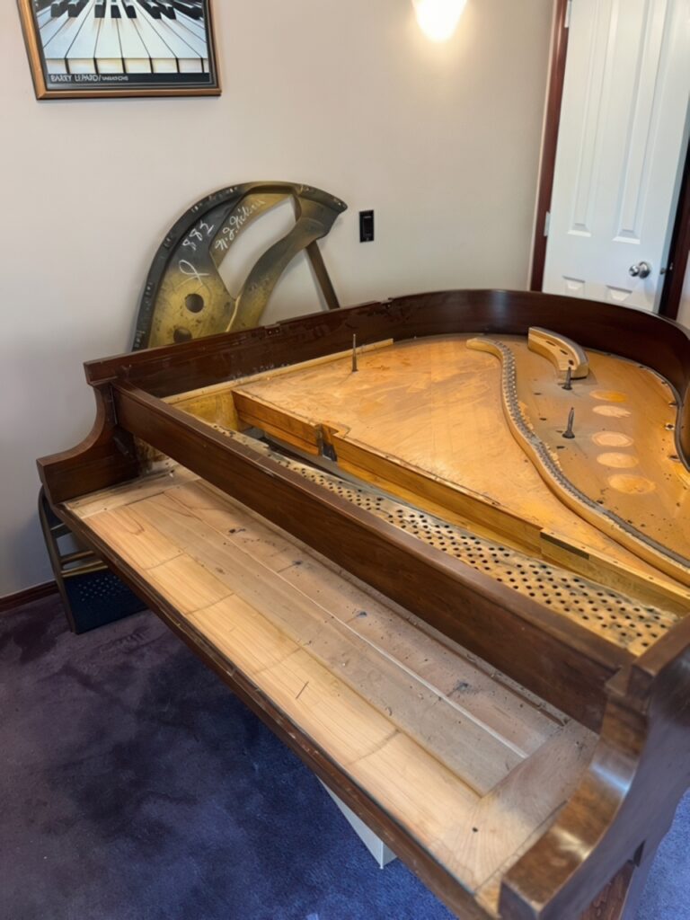 Image showcasing custom piano rebuilds of a Steinway S before restoration.